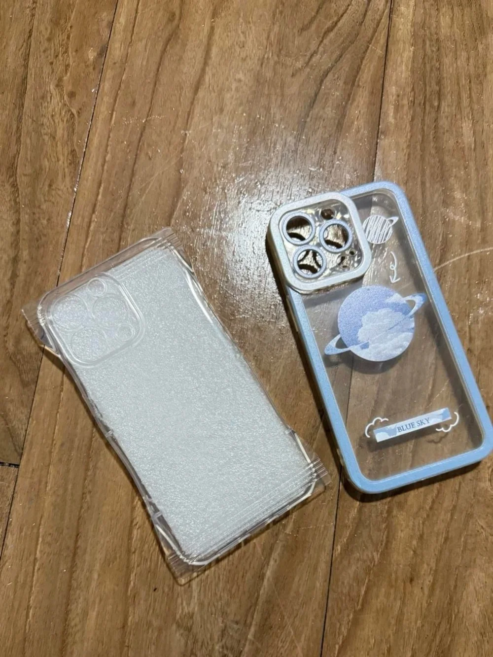 Blue Graphic iPhone Case with Planet Design